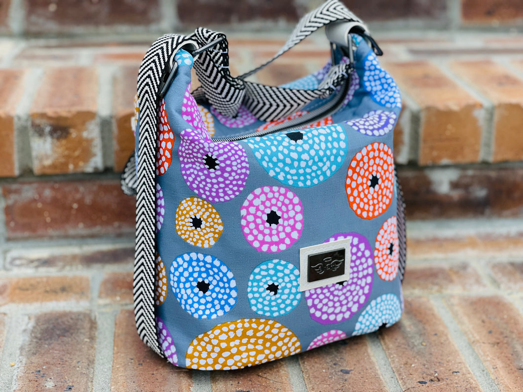 The Krystal Convertible Handbag in Modern Circles