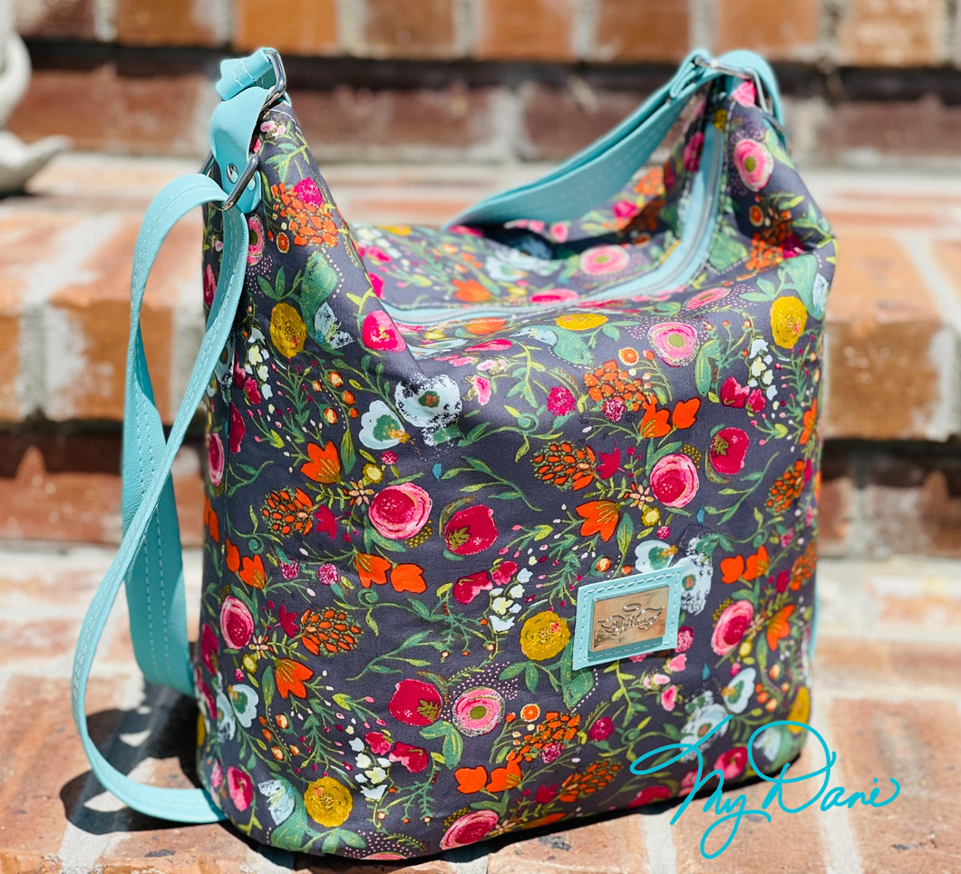 The Krystal Convertible Handbag in Grey Floral w/ Turquoise Marine Vinyl