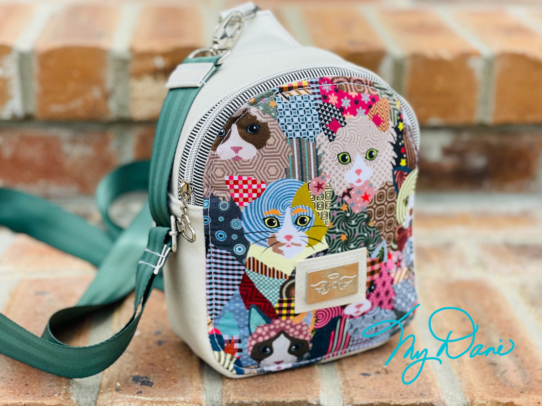 The MavPac Mini Backpack in Cats and Off White