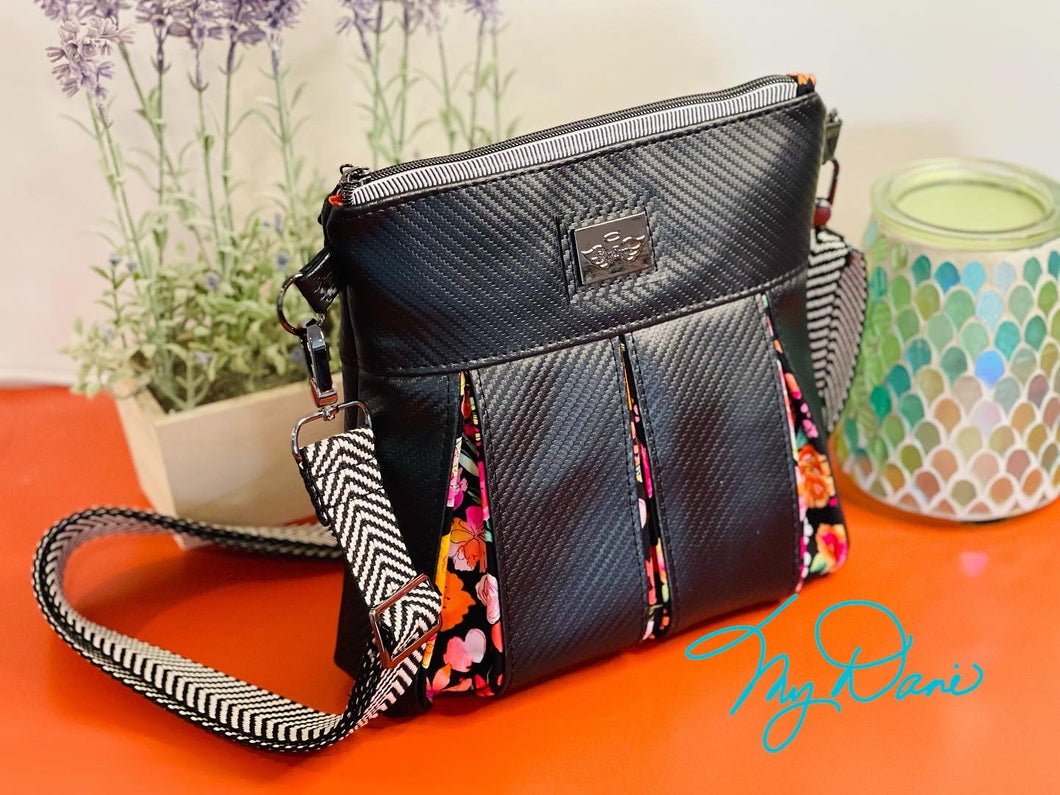 The Ayla Crossbody Bag in Bright Floral and Textured Black.